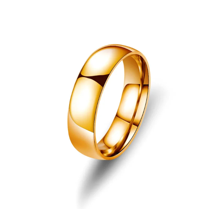 Anillo de acero inoxidable pulido en tonos dorado, rosa y negro