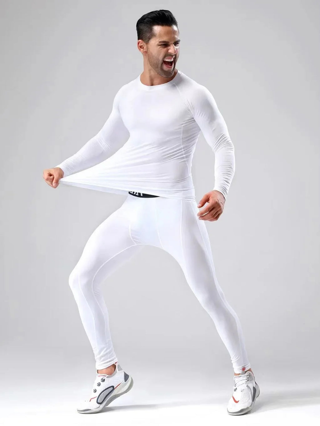 Conjunto deportivo de compresión para hombre, remera y calza elastizada
