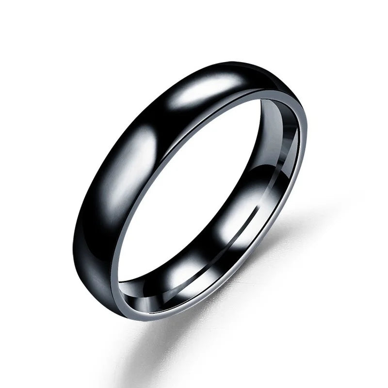 Anillo de acero inoxidable pulido en tonos dorado, rosa y negro